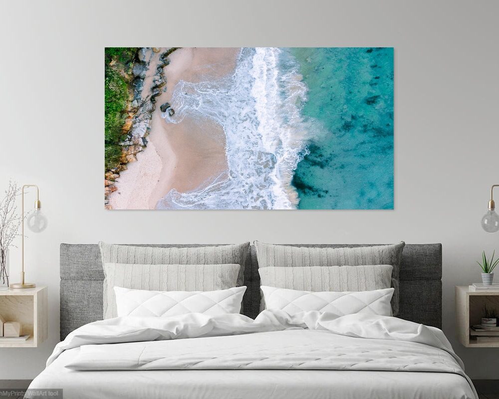 drone photograph of a wave crashing at norah head beach